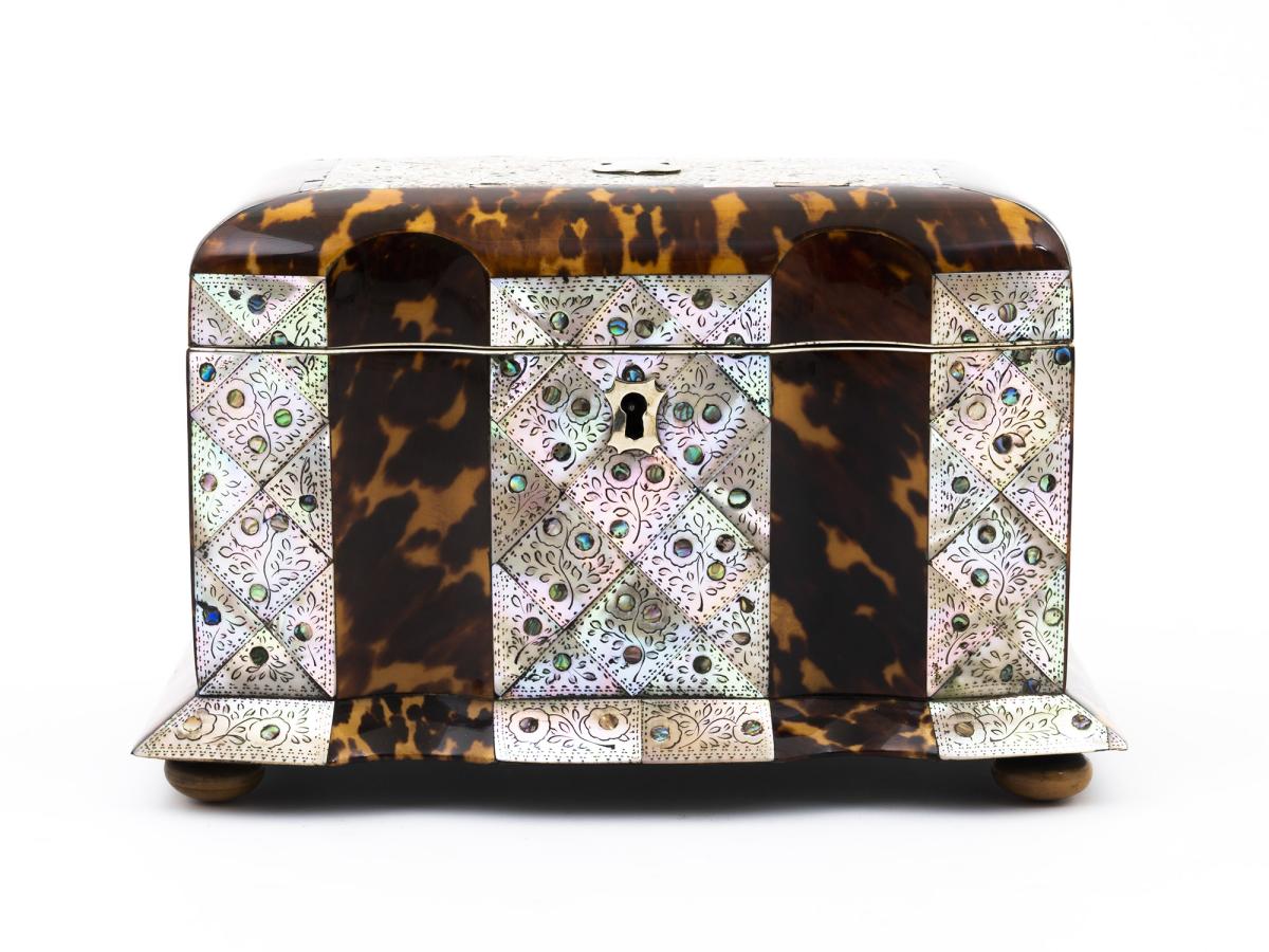 Front of the tortoiseshell and mother of pearl tea caddy 