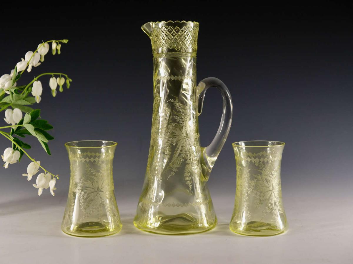 Antique glass citrine jug and two goblets English circa 1900