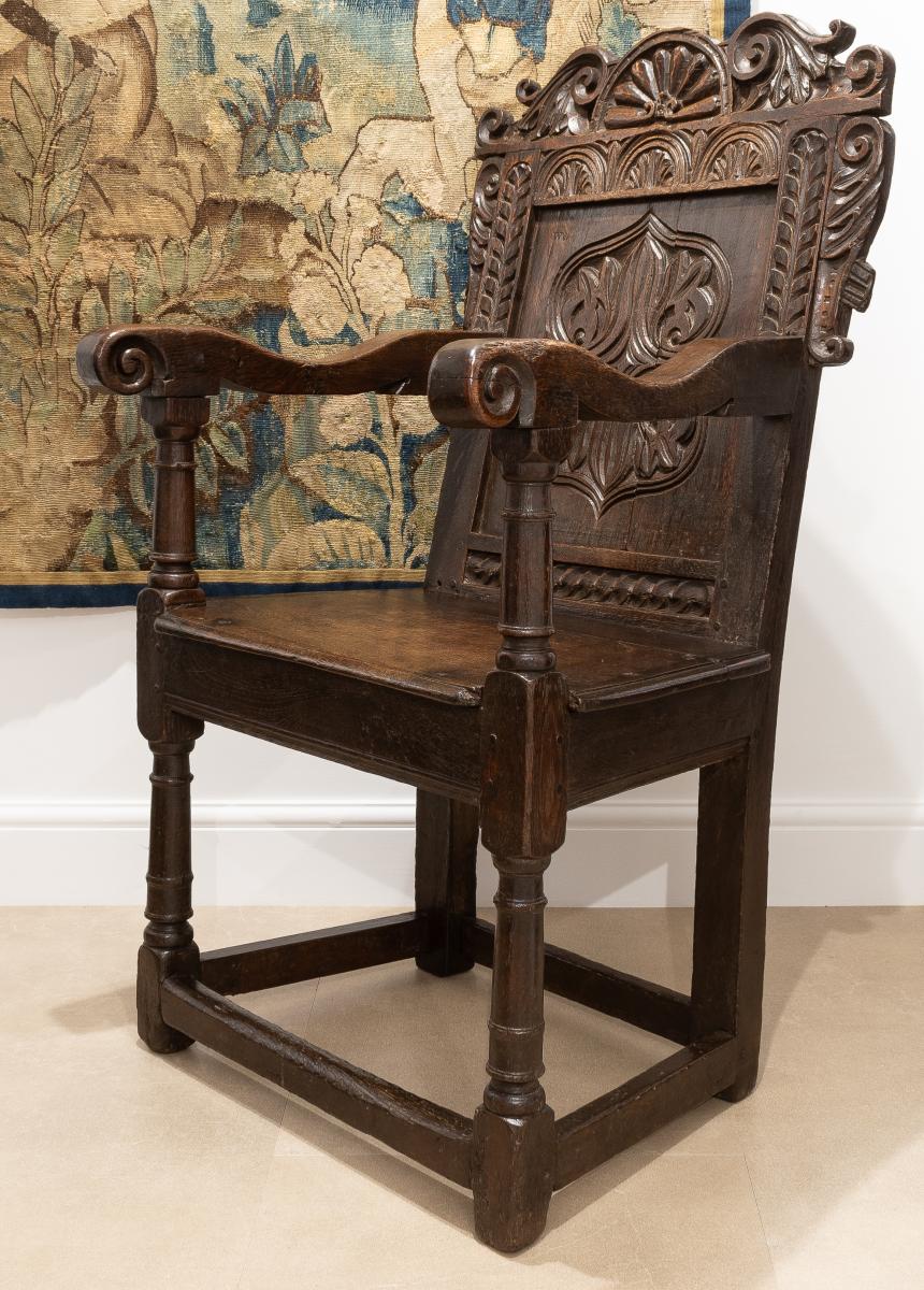 A Charles I joined oak panel back open armchair, Gloucestershire/Wiltshire border, circa 1630-40