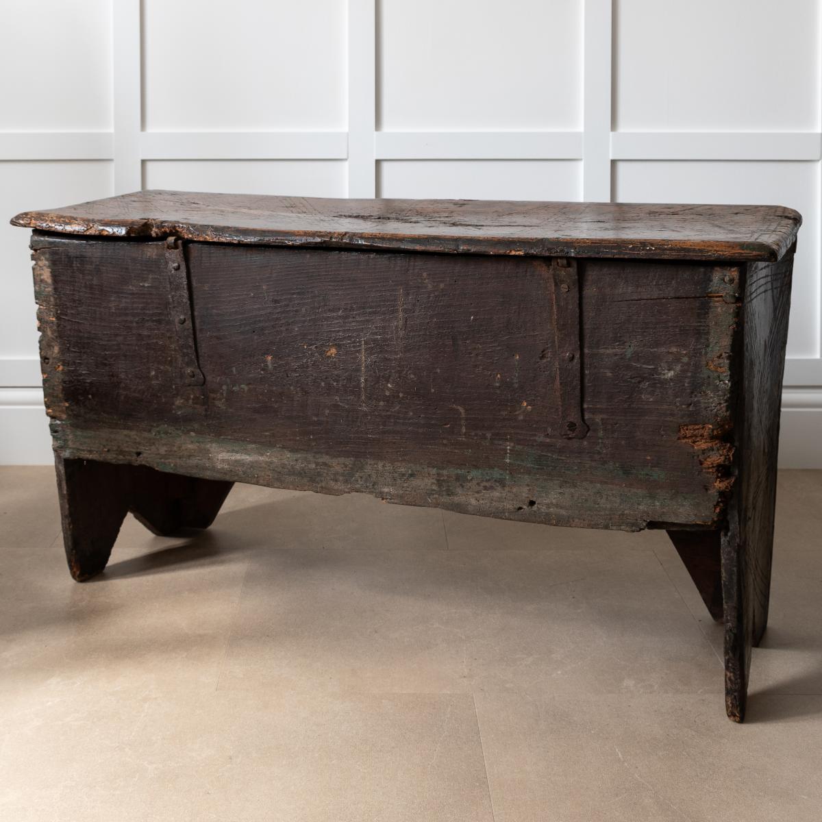 A rare Henry VIII boarded elm, oak and polychrome-decorated chest, circa 1520-30