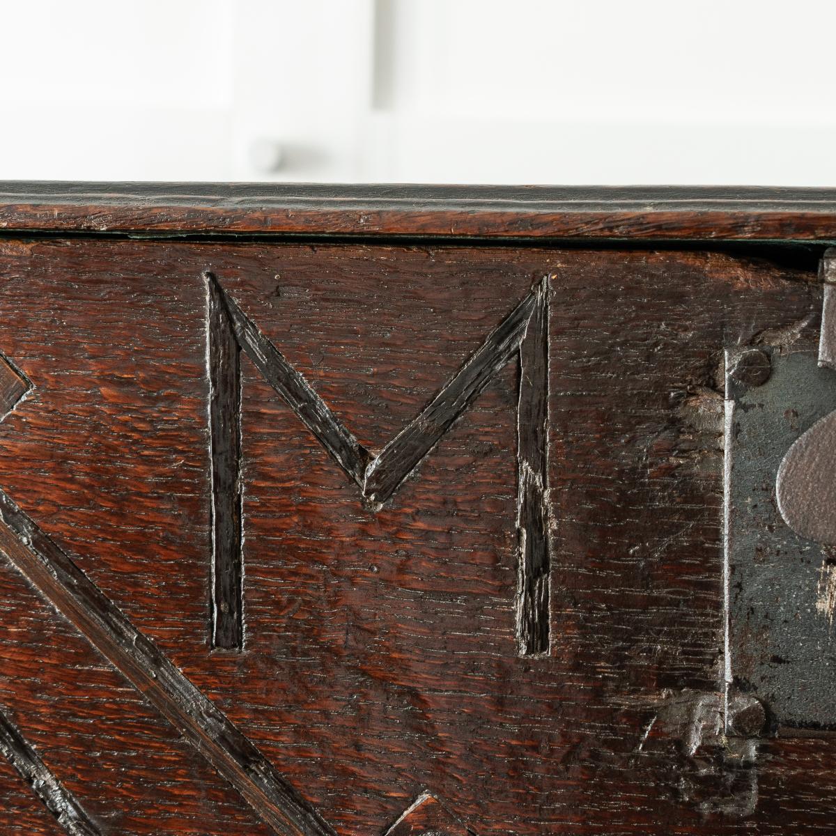 A Charles II boarded oak and inlaid box, initialled and dated 1667