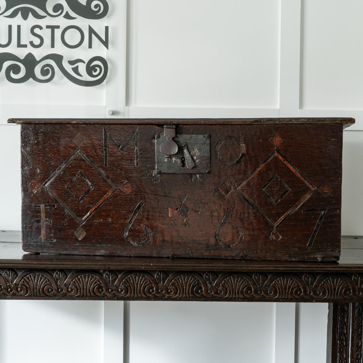 A Charles II boarded oak and inlaid box, initialled and dated 1667