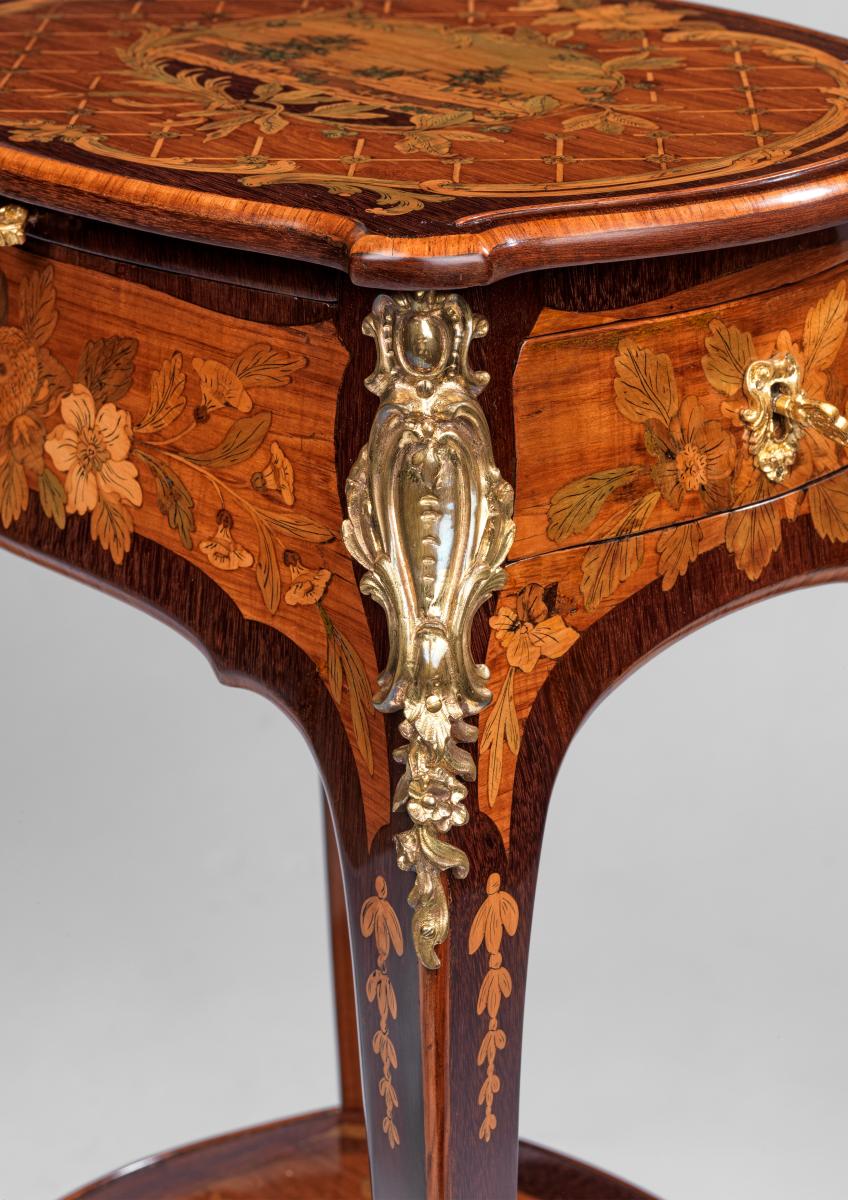 A Louis XV Ormolu-Mounted Tulipwood, Amaranth and Fruitwood Marquetry Occasional Table by Leonard Boudin. Circa 1765.
