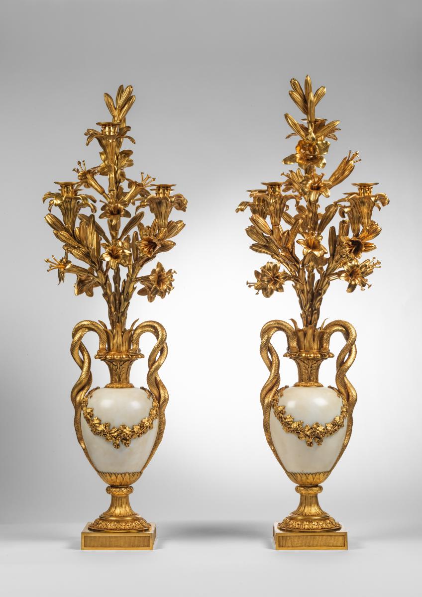 A Pair of Louis XVI Gilt Bronze and White Marble Five Light Candelabra. Circa 1780