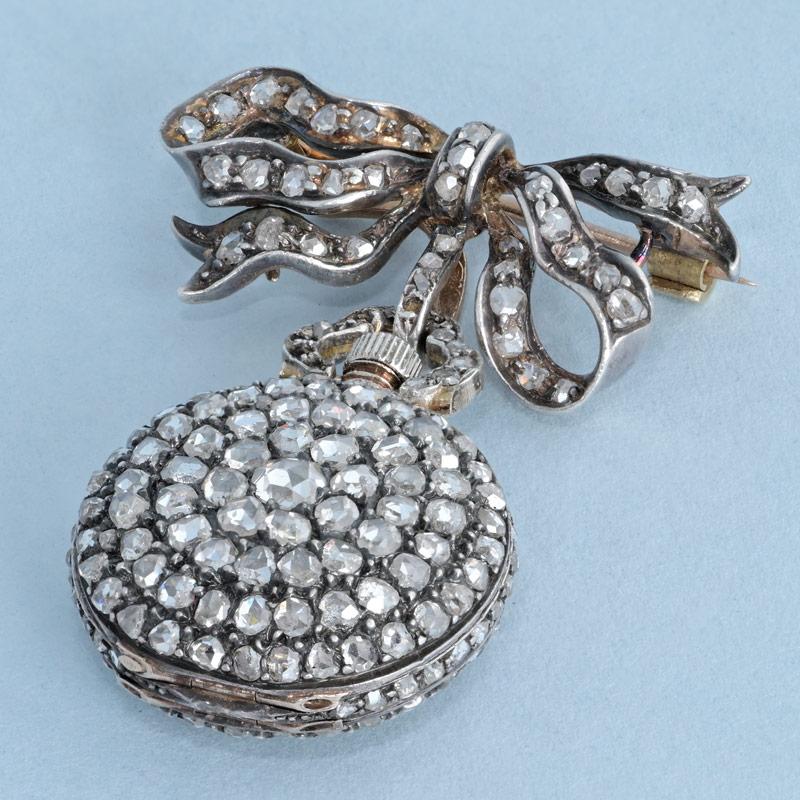Small Diamond Set Gold Watch and Pendant