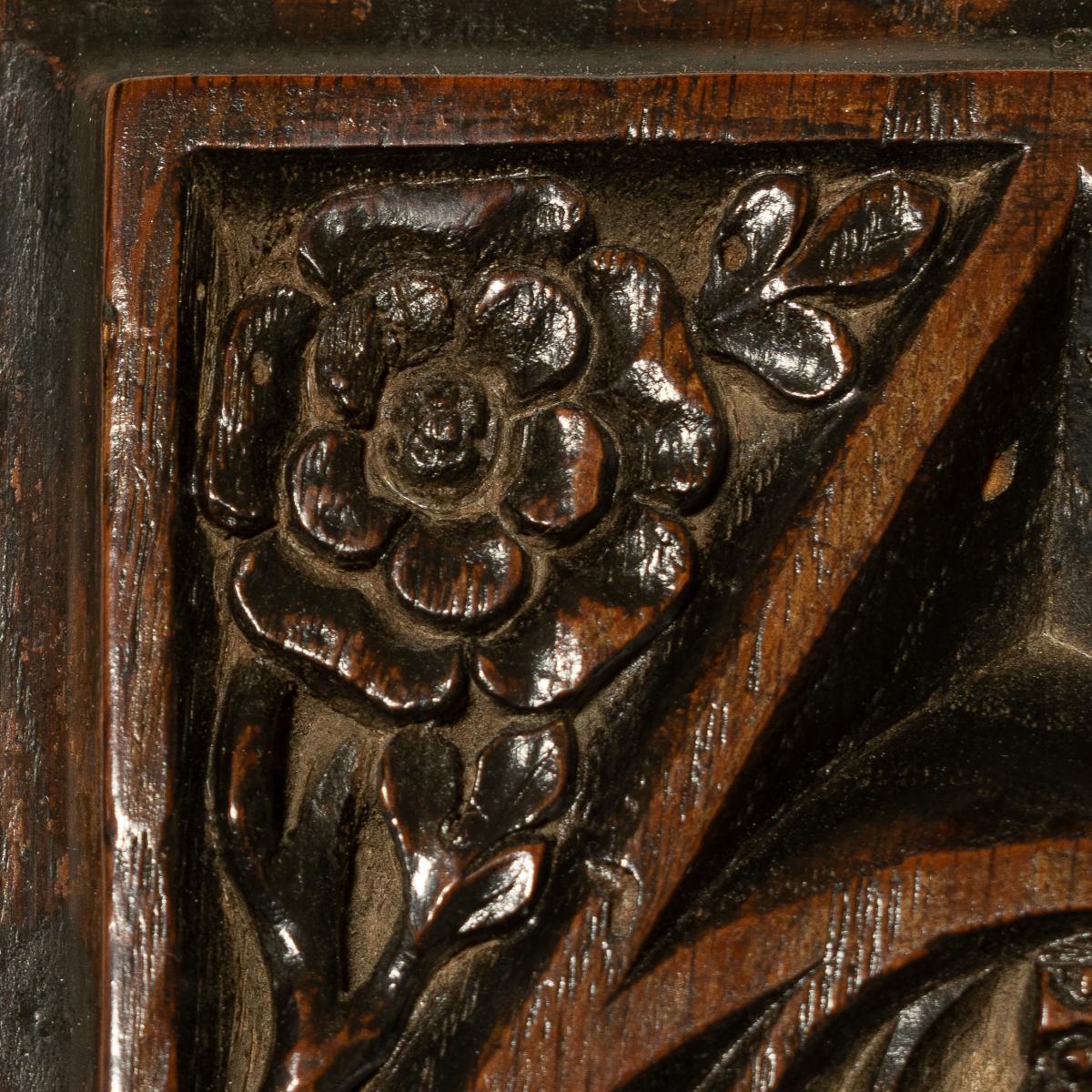 King's College Cambridge: A Henry VII/VIII oak panel, carved with the college arms and royal cypher, circa 1505-37