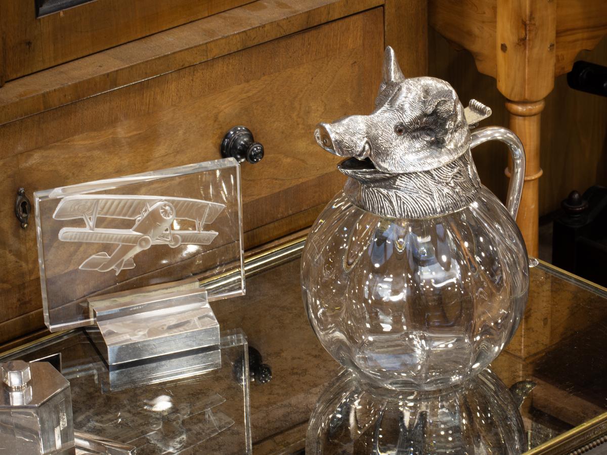 Overview of the Boars head decanter in a decorative setting
