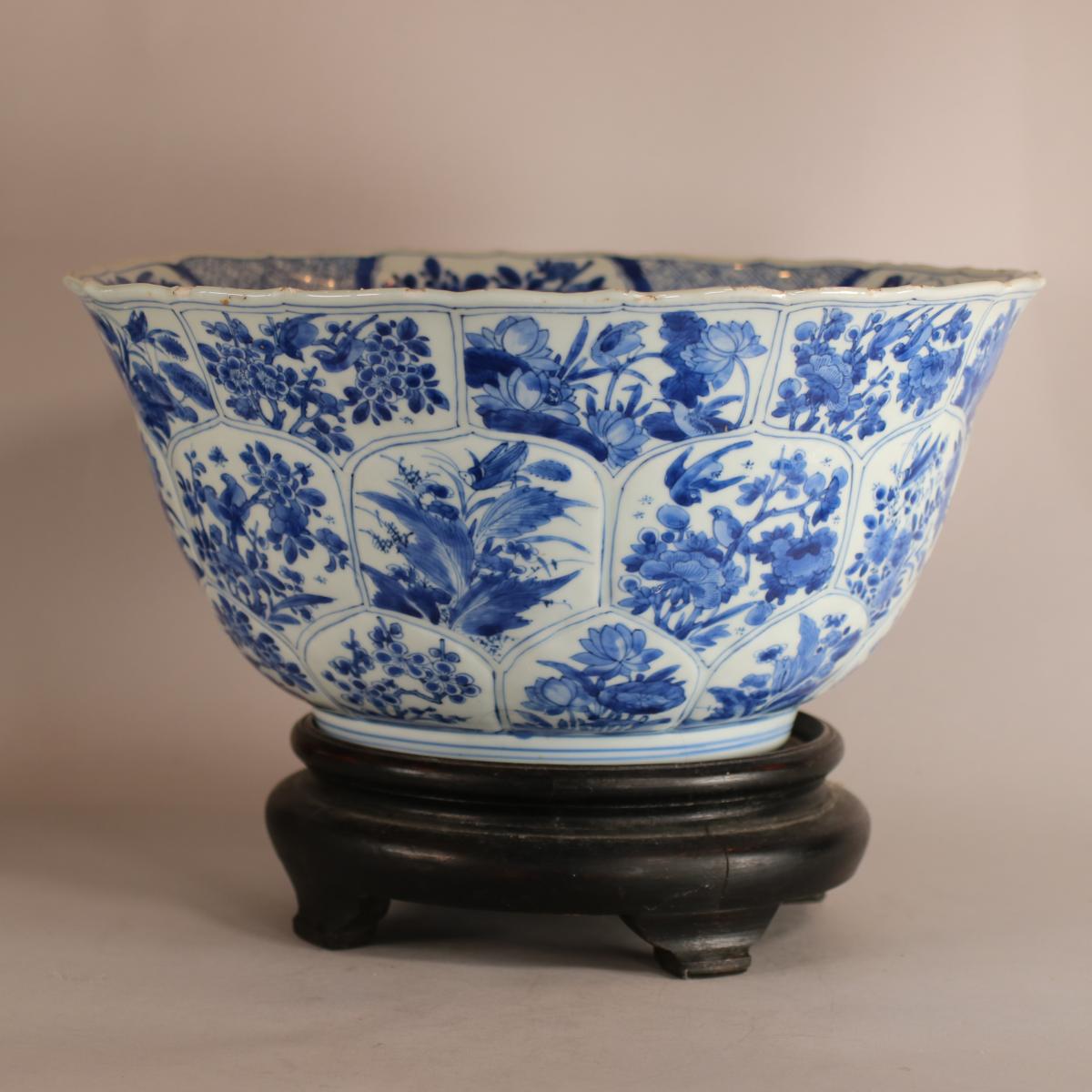 Kangxi moulded blue and white bowl with birds and flowers