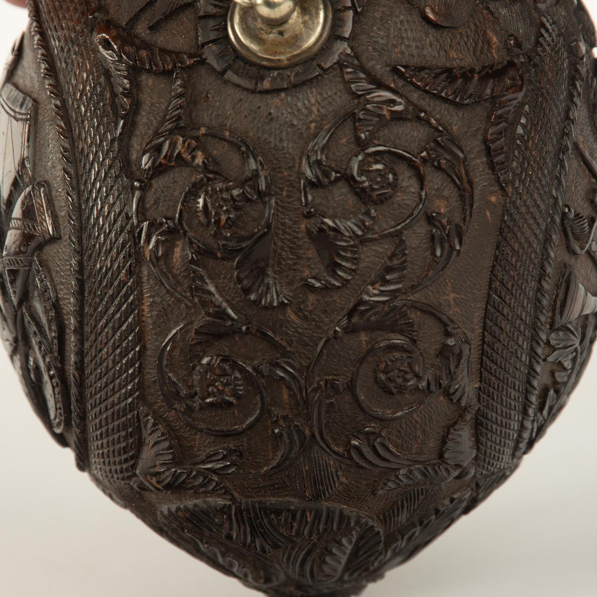 A sailor’s carved coconut Bugbear powder flask