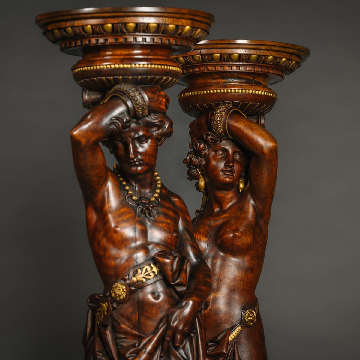 Italian Carved Walnut and Parcel Gilt Figural Torchères by Angiolo Barbetti, (1805-1873)