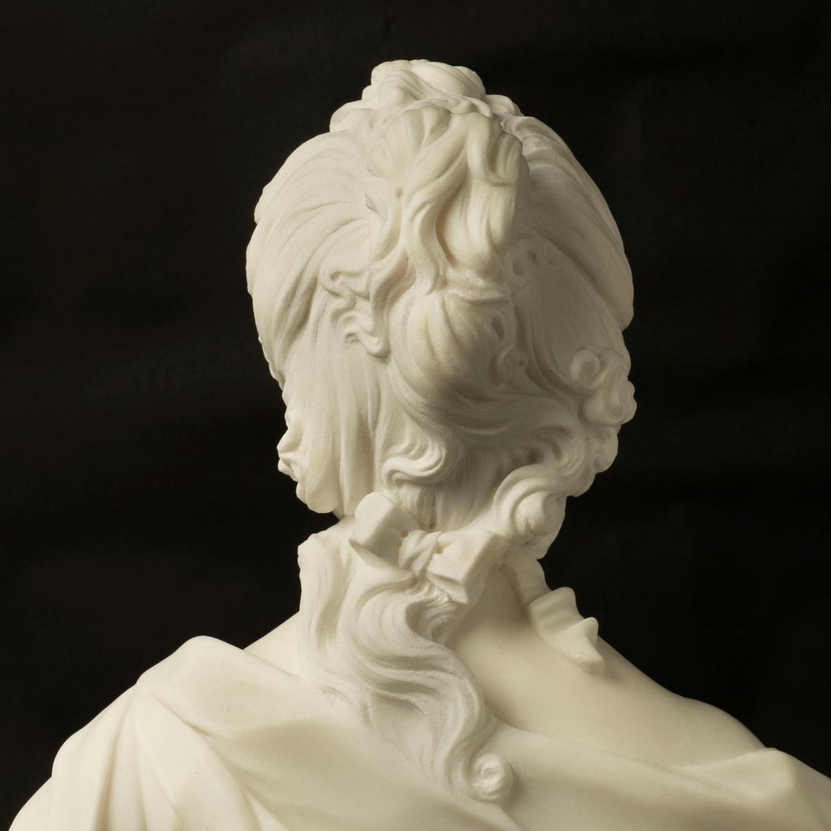 Marble Bust of a Classical Maiden