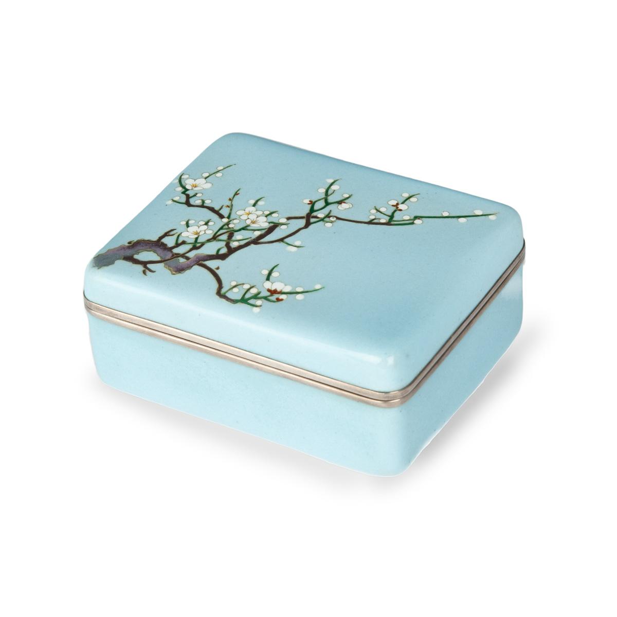 A small Showa period cloisonné box with a single branch of blossom