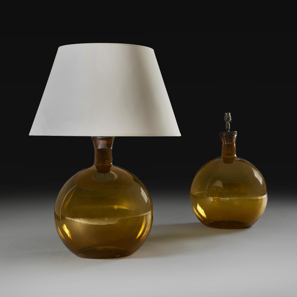A Pair of Amber Glass Vessels as Lamps