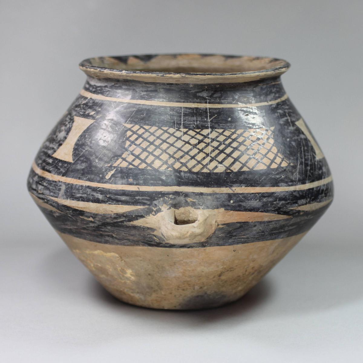 Side and handle of Chinese Neolithic funerary earthenware urn