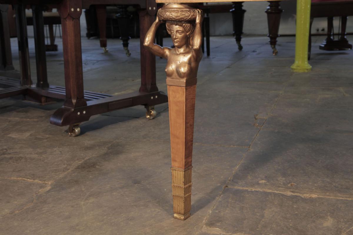Square, tapered piano leg with female nude caryatid top