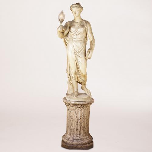 FIGURE OF FLORA HOLDING A LAMP
