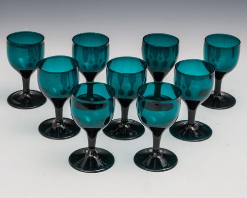 A Fine Set of Nine Regency Green Glasses