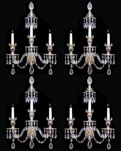 A SET OF FOUR ORMOLU MOUNTED CUT GLASS WALL LIGHTS IN ADAM STYLE, English Circa 1900