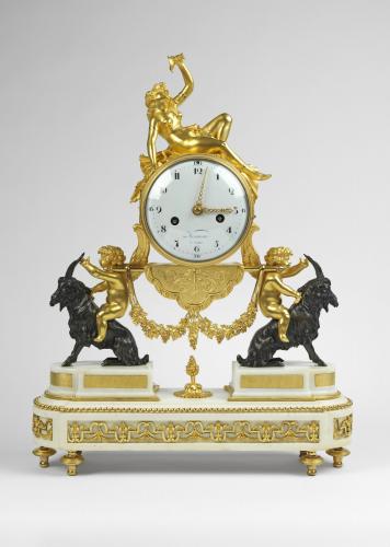 A Louis XVI Ormolu and White Marble Mantel Clock by Maniere Circa 1790