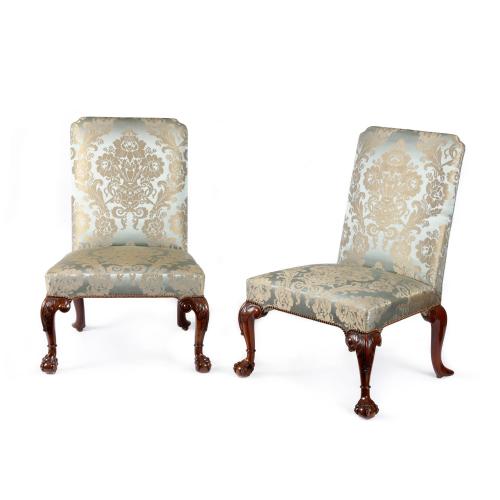 A pair of George II carved walnut side chairs attributed to William Hallet