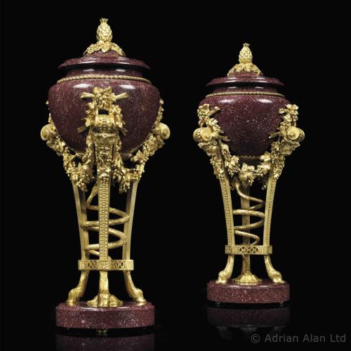 A Pair of Louis XVI Style Gilt-Bronze Mounted Egyptian Porphyry Urns, After the Model by Pierre Gouthière. French, Circa 1870.