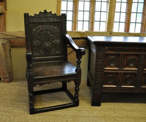A Mid 17th Century English Carved and Dated Oak Wainscot Chair