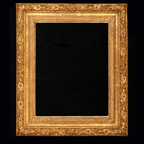 French, Louis XIII, carved and gilded frame with guilloche sight moulding and imbricated laurel leaf and berry ornament 