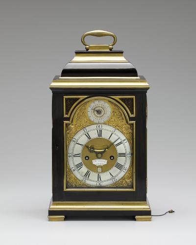 John Everell, London A fine Geo III brass bound ebony veneered table clock of small size