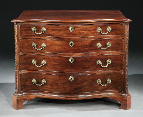 A George III Mahogany Serpentine Chest of Drawers in the Manner of Thomas Chippendale