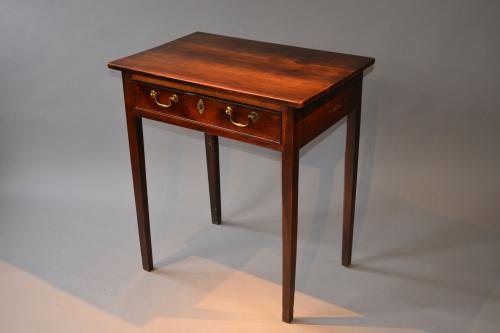 An elegant George III fruitwood side table