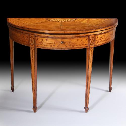 A fine quality Adam period satinwood and marquetry tea table