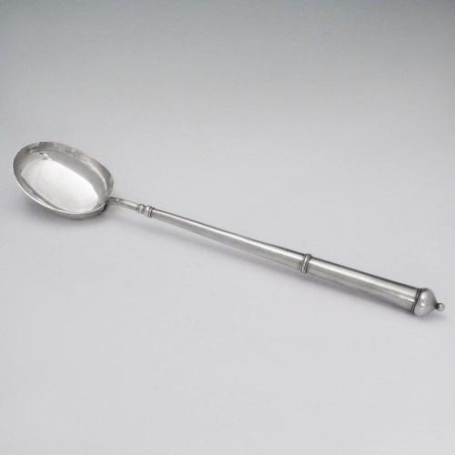 A Queen Anne Antique English Silver Basting Spoon