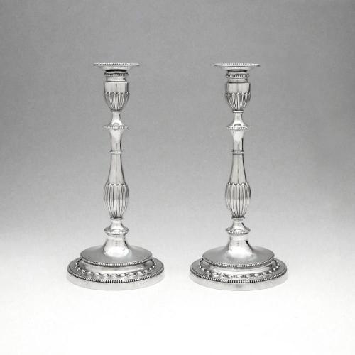 A Pair of George III Antique English Silver Candlesticks