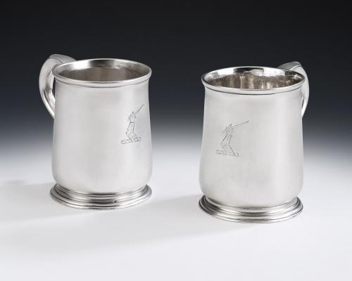 A very rare pair of early George II Mugs made in London in 1729 by Thomas Mason.