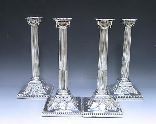Four Georgian silver candlesticks John Carter 1772