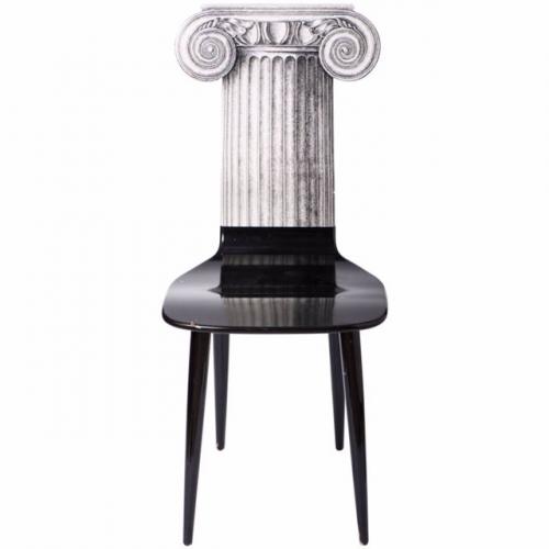 A Piero Fornasetti chair “Capitello Ionico.”