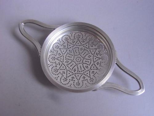 An unusual George III Strainer made in London in 1807 by John Emes