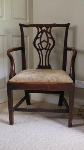 A late-18th/early-19th century mahogany open armchair