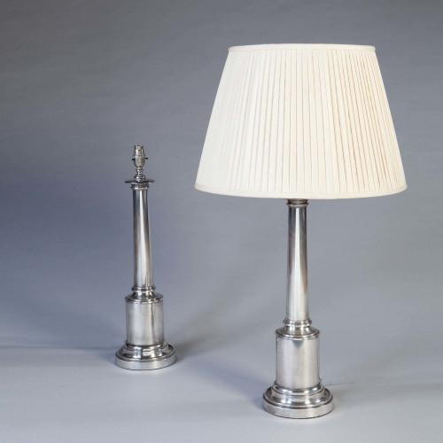 A Fine Pair of Silver Plated Lamps