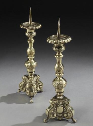A pair of 19th century, brass, repousse candlestick lamps