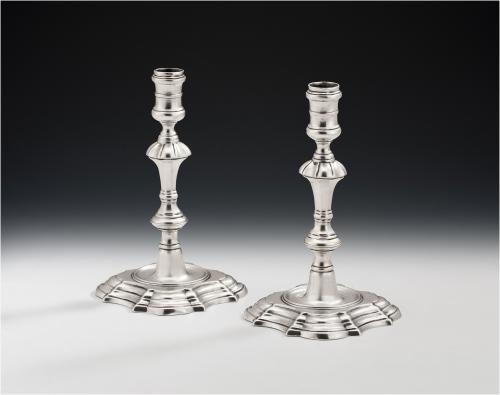 A very rare pair of George II Cast Tapersticks made in London in 1745 by James Gould