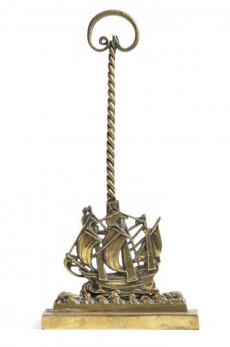 A 19th century brass ship doorstop, in the form of the Mayflower