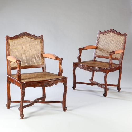 A Pair of Walnut Caned Bergeres