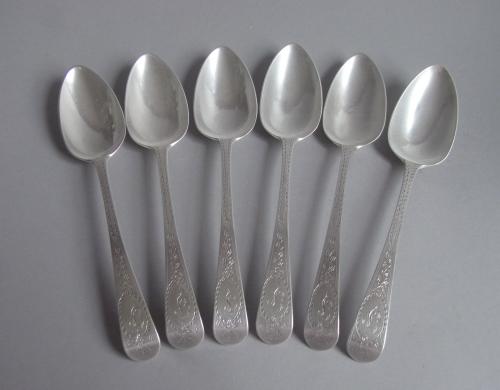 A very fine set of six George III Bright Cut Tablespoons made in London in 1791 by Godbehere & Wigan