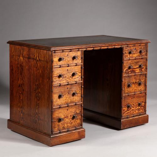 A Fine Rosewood Simulated Kneehole Desk by A Blain & Sons
