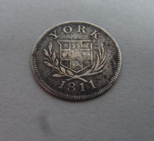 A rare George III Six Pence made in York in 1811 by Cattle & Barber