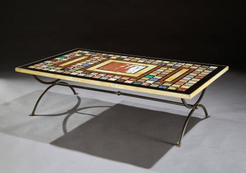 Specimen marble pietre dura top united with a metal table base in the manner of Marcel Coard