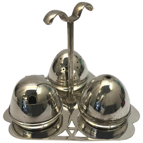 Antique Silver plated condiment set comprising of a salt a pepper and a mustard pot