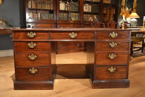 A George II mahogany partners desk Circa 1740