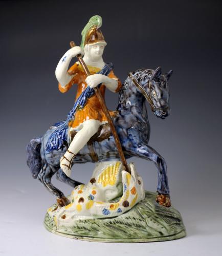 English pottery figure of Saint George slaying the Dragon antique period c1790/1810